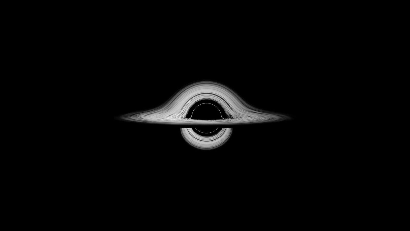 A black hole: a ring of light bent around a dark centre